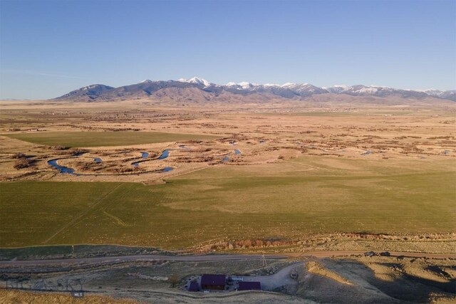 mountain view featuring a rural view