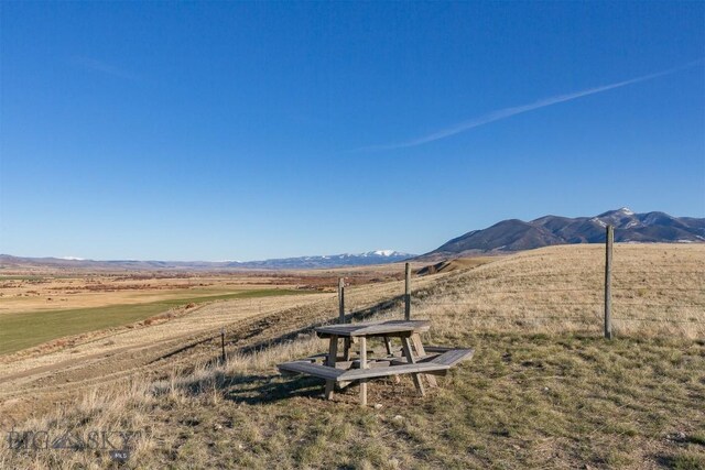 view of mountain feature with a rural view