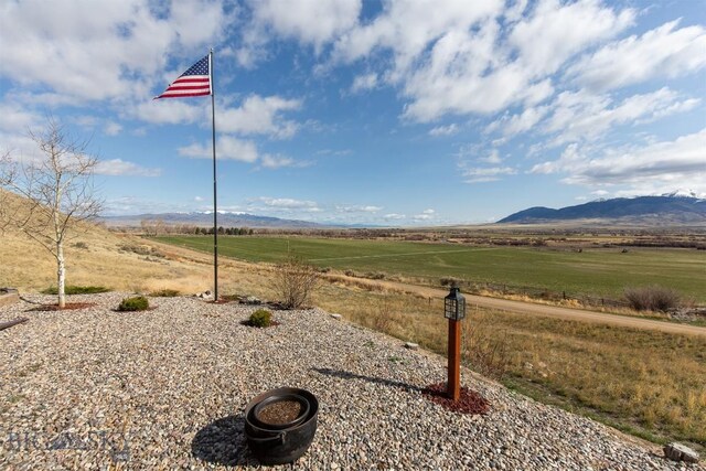 view of mountain feature with a rural view
