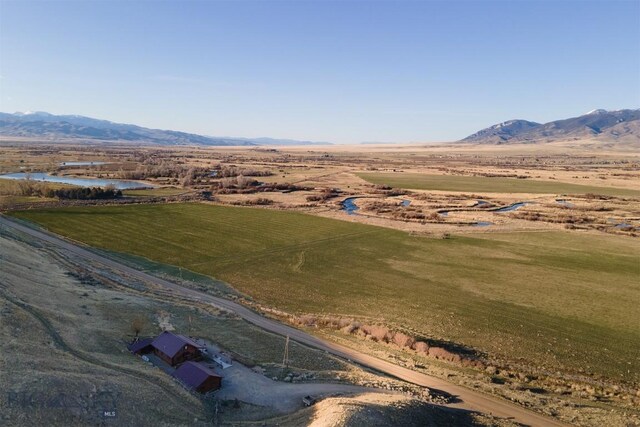aerial view featuring a rural view and a mountain view