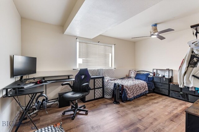 250 Jackson Ln, Belgrade, MT 59714 - bedroom featuring wood finished floors and ceiling fan
