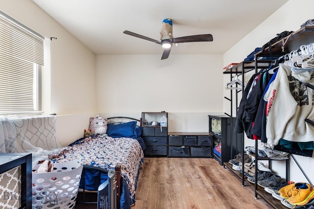 250 Jackson Ln, Belgrade, MT 59714 - bedroom with wood finished floors and a ceiling fan