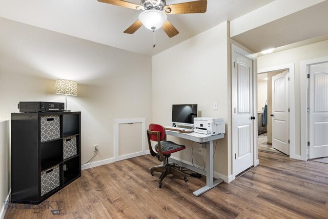 250 Jackson Ln, Belgrade, MT 59714 - office with wood finished floors, ceiling fan, and baseboards