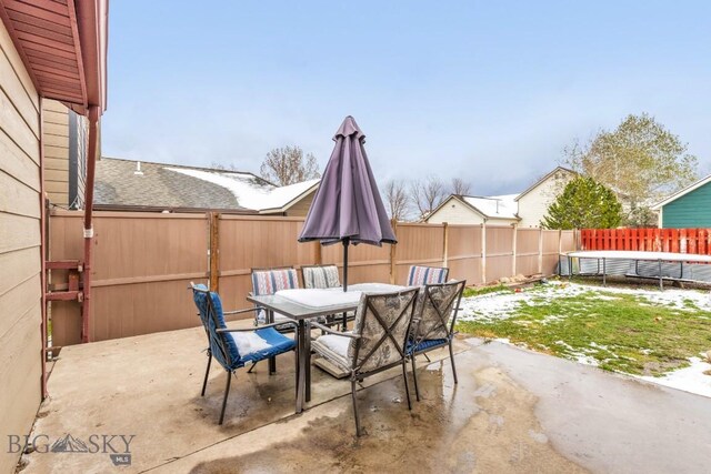 250 Jackson Ln, Belgrade, MT 59714 - fenced backyard with a patio area and outdoor dining area