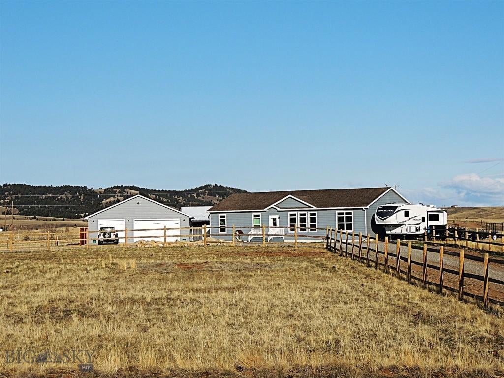 view of front of home with fence