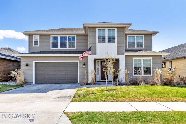 view of front of home featuring an attached garage, concrete driveway, and a front yard