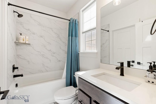 bathroom featuring vanity, shower / bath combo, and toilet