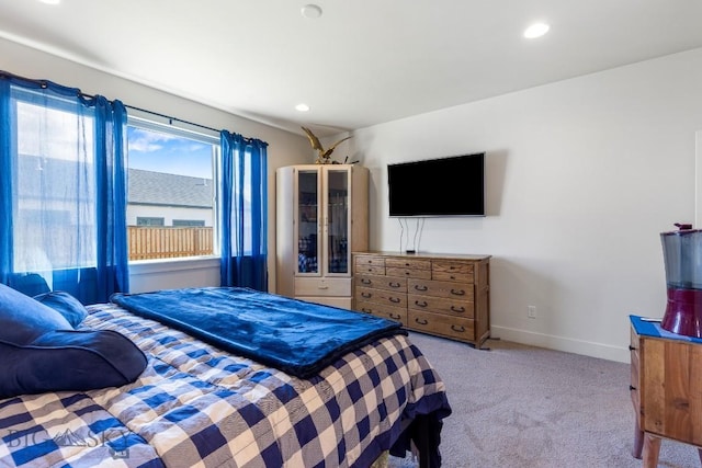 bedroom featuring carpet floors, baseboards, and recessed lighting