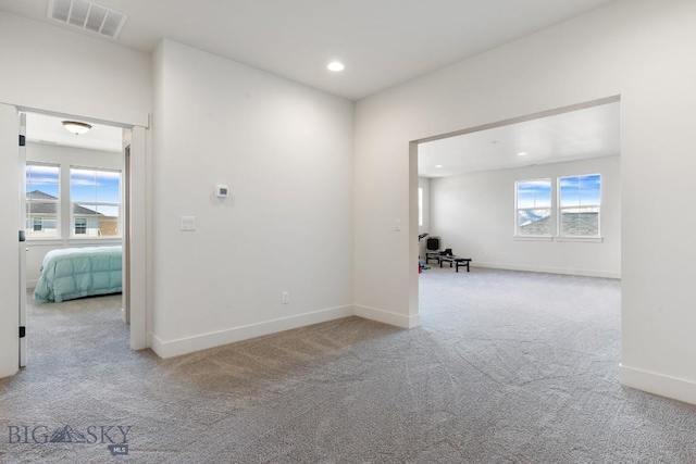 1508 Deadwood Loop, Belgrade, MT 59714 - carpeted spare room featuring baseboards and recessed lighting