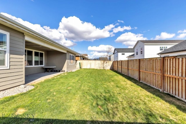 view of yard featuring a fenced backyard and a patio area