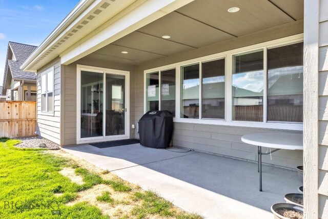 1508 Deadwood Loop, Belgrade, MT 59714 - view of patio / terrace with fence and a grill