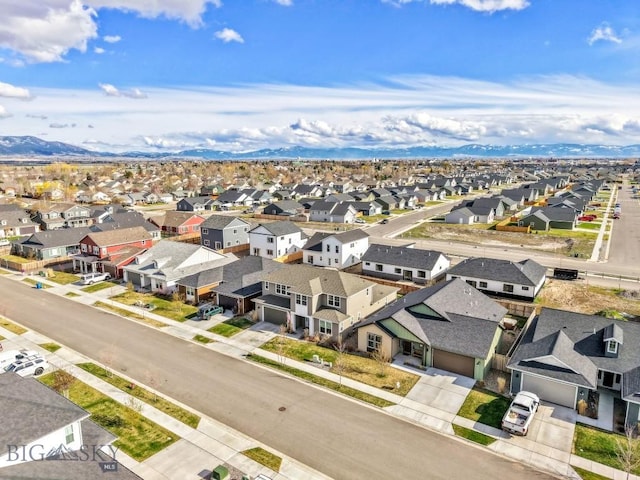 birds eye view of property featuring a residential view and a mountain view