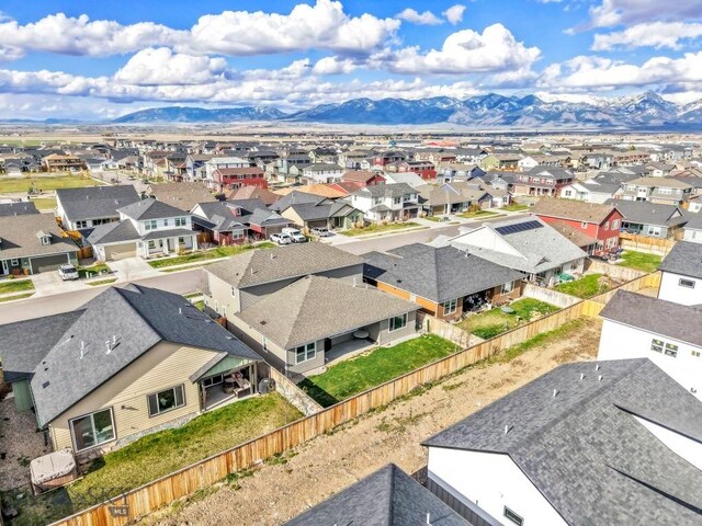 bird's eye view featuring a residential view and a mountain view