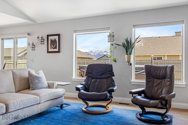 1708 Drummond Blvd, Belgrade, MT 59714 - living area featuring wood finished floors and baseboards