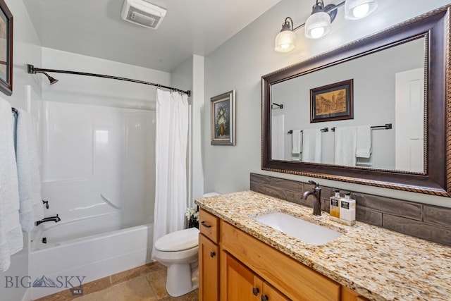 1708 Drummond Blvd, Belgrade, MT 59714 - bathroom featuring toilet, shower / bath combo, and vanity