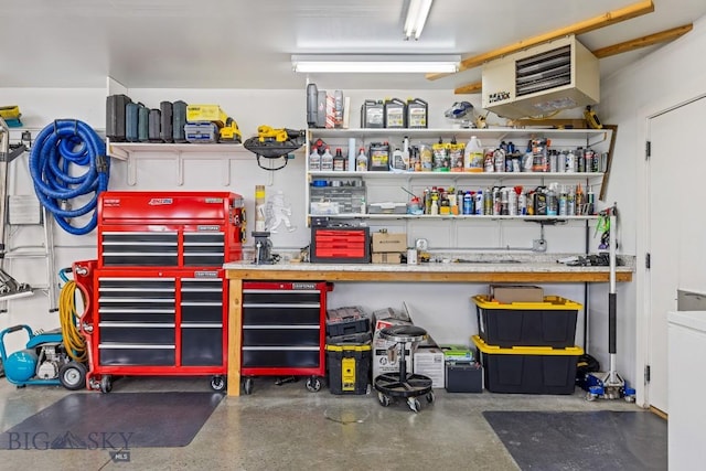 1708 Drummond Blvd, Belgrade, MT 59714 - garage featuring a heating unit