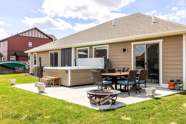 1708 Drummond Blvd, Belgrade, MT 59714 - back of house with a hot tub, a patio area, a fire pit, roof with shingles, and board and batten siding