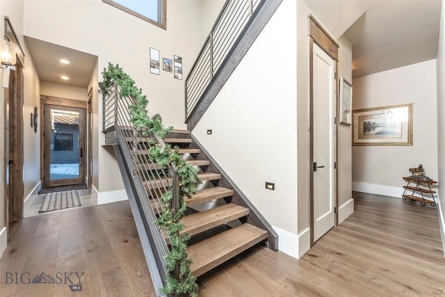 18 Moon Shadow Dr, Bozeman, MT 59715 - stairway featuring baseboards and wood finished floors