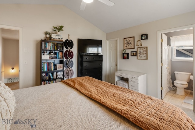 bedroom with lofted ceiling, ceiling fan, and ensuite bathroom
