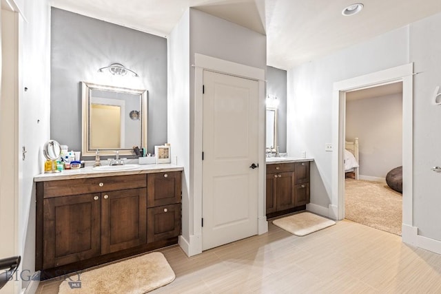 31 Haystack Dr, Bozeman, MT 59718 - ensuite bathroom featuring baseboards, vanity, and connected bathroom