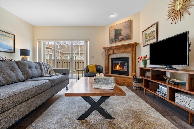 268 Pine Creek Dr, Bozeman, MT 59718 - living area featuring wood finished floors and a tile fireplace