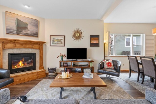 268 Pine Creek Dr, Bozeman, MT 59718 - living room with wood finished floors and a fireplace