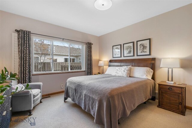 268 Pine Creek Dr, Bozeman, MT 59718 - bedroom featuring baseboards and carpet floors
