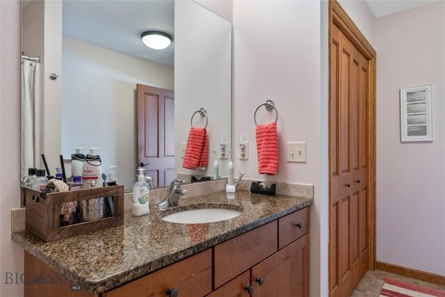 268 Pine Creek Dr, Bozeman, MT 59718 - bathroom with vanity and a closet