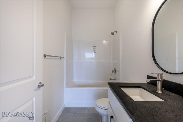 209 Pearl St, Ennis, MT 59729 - bathroom with vanity, toilet, tile patterned floors,  shower combination, and baseboards