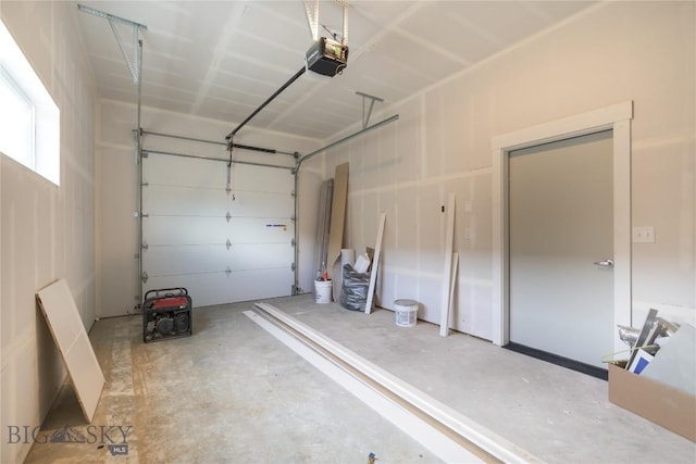 209 Pearl St, Ennis, MT 59729 - garage featuring a garage door opener