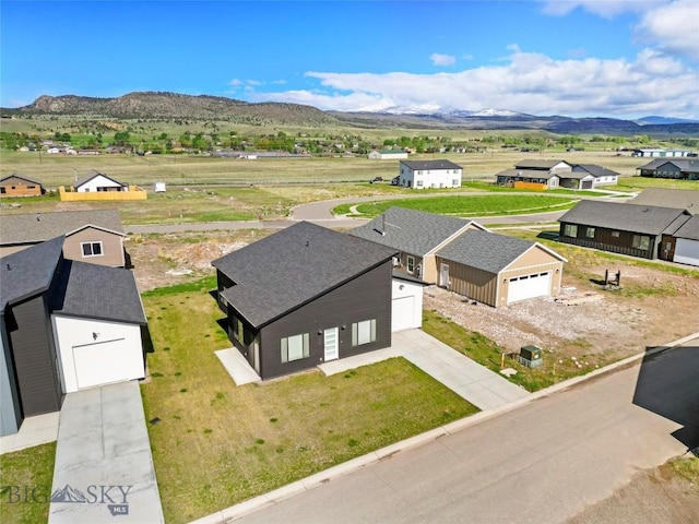 209 Pearl St, Ennis, MT 59729 - aerial view of residential area with mountains