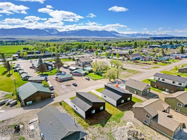 209 Pearl St, Ennis, MT 59729 - aerial view of residential area featuring mountains