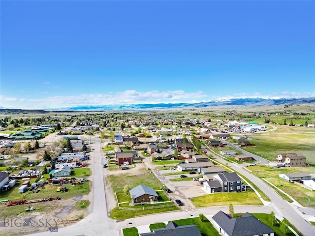 209 Pearl St, Ennis, MT 59729 - aerial view of residential area featuring a mountain backdrop