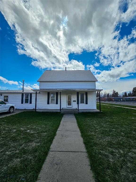 602 Harris, Big Timber, MT 59011 - view of front of property featuring a porch and a front lawn