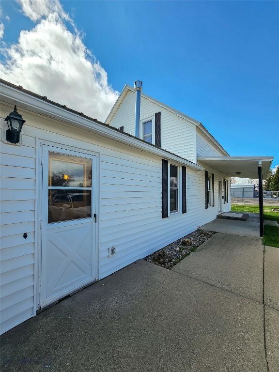 602 Harris, Big Timber, MT 59011 - view of side of property featuring a patio