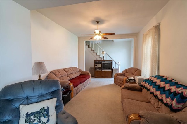 602 Harris, Big Timber, MT 59011 - living area with a ceiling fan, stairs, and light carpet