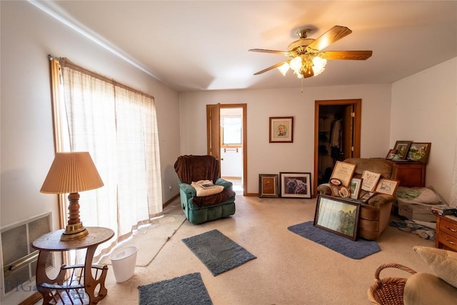 602 Harris, Big Timber, MT 59011 - living area featuring carpet floors, visible vents, and a ceiling fan