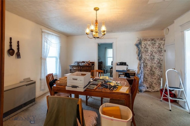 602 Harris, Big Timber, MT 59011 - carpeted dining area featuring a chandelier