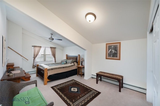 682 E River Rd, Pray, MT 59065 - carpeted bedroom with baseboard heating, ceiling fan, and vaulted ceiling