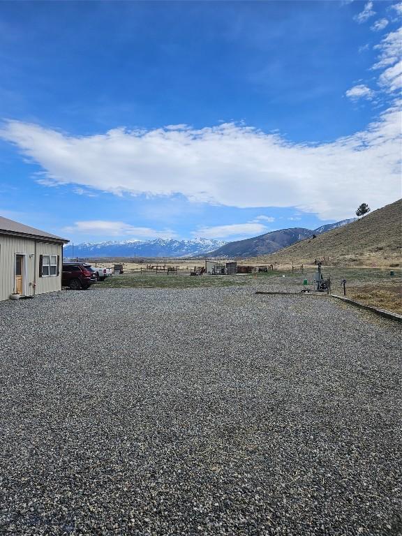 682 E River Rd, Pray, MT 59065 - view of yard with a mountain view
