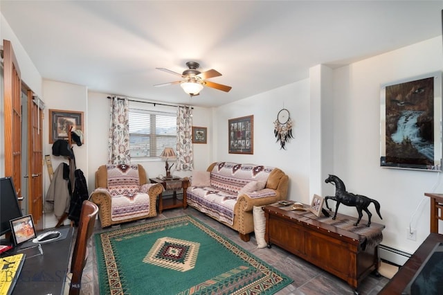 682 E River Rd, Pray, MT 59065 - living area featuring a ceiling fan and a baseboard radiator
