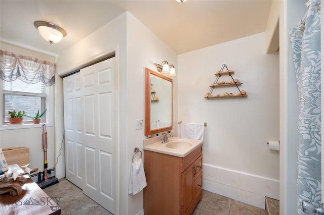 682 E River Rd, Pray, MT 59065 - bathroom with vanity and tile patterned flooring