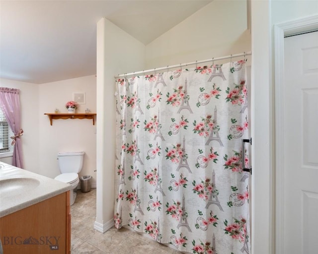 682 E River Rd, Pray, MT 59065 - bathroom with toilet, vanity, tile patterned flooring, and a shower with curtain