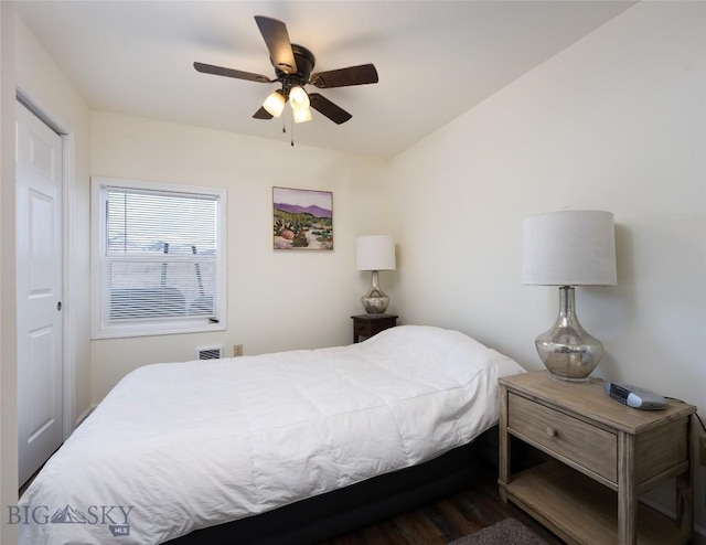 682 E River Rd, Pray, MT 59065 - bedroom featuring wood finished floors and a ceiling fan