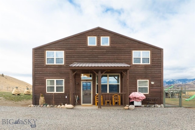 682 E River Rd, Pray, MT 59065 - back of house featuring a mountain view