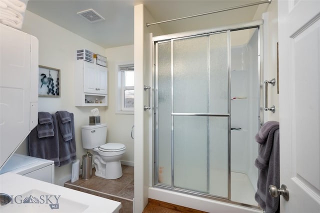 682 E River Rd, Pray, MT 59065 - full bathroom featuring toilet and a stall shower