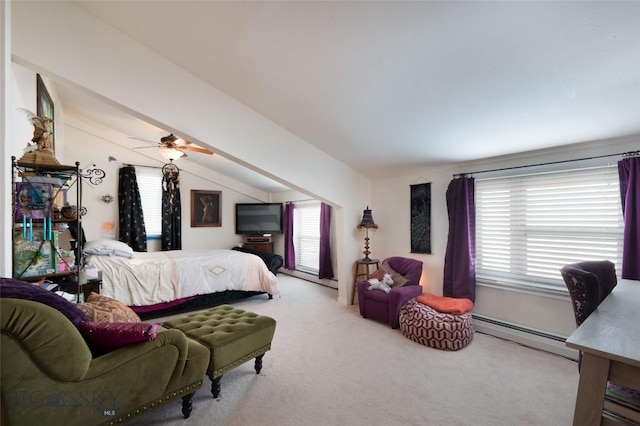682 E River Rd, Pray, MT 59065 - bedroom featuring baseboard heating, carpet, multiple windows, vaulted ceiling, and a ceiling fan