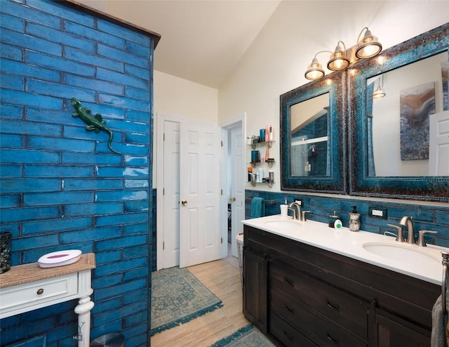 682 E River Rd, Pray, MT 59065 - bathroom with double vanity and vaulted ceiling