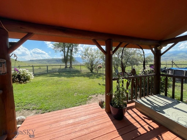682 E River Rd, Pray, MT 59065 - wooden deck featuring a rural view