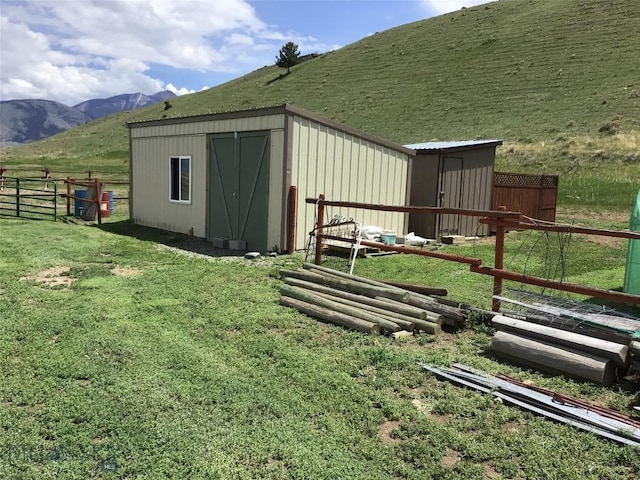 682 E River Rd, Pray, MT 59065 - view of shed featuring a mountain view
